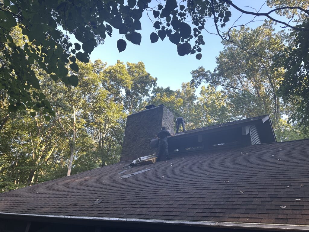 Water stains on ceiling caused by chimney flashing failure