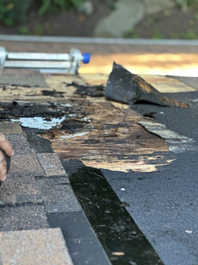 Installing step flashing for chimney leak protection in Knoxville