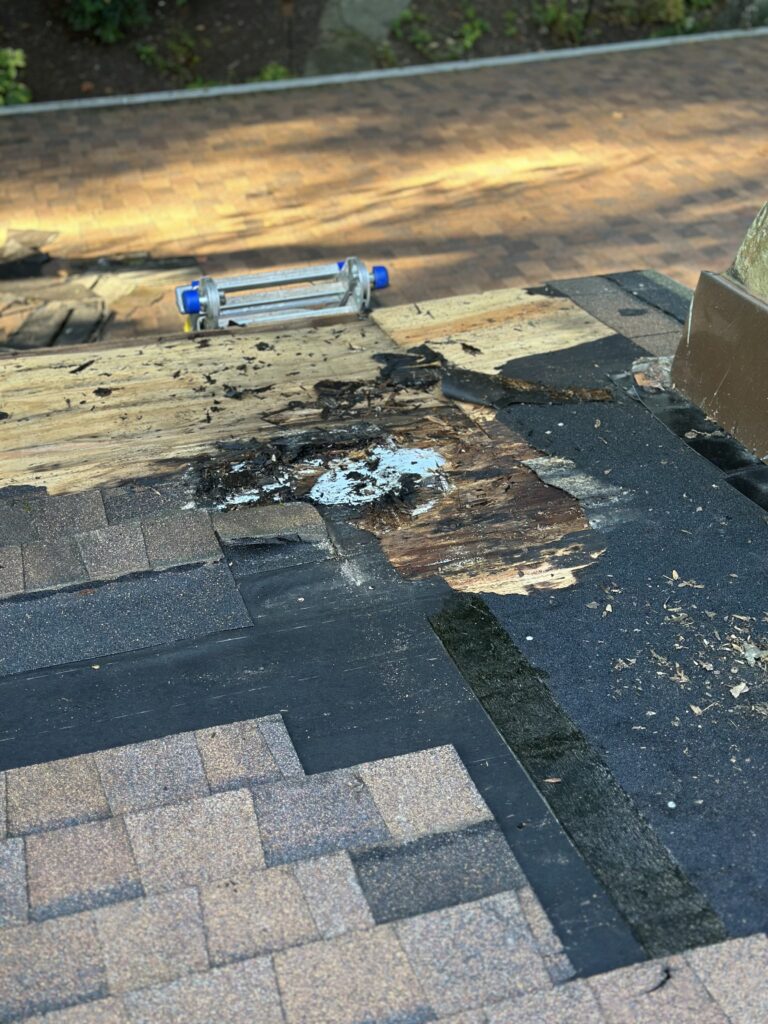 Failed roof flashing behind siding due to poor installation