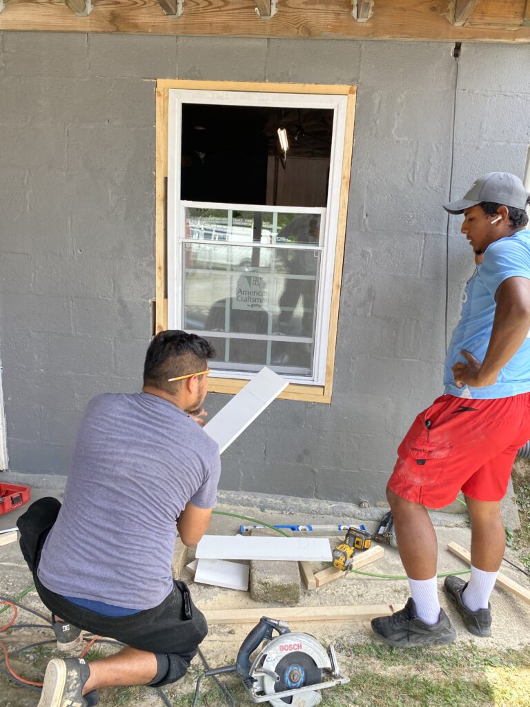 Signs of window failure including foggy glass and air leaks in Knoxville home