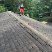 A professional MI Homesiding & Roofing roof inspection in Knoxville identifying common problems like leaks and wind damage.