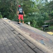 A professional MI Homesiding & Roofing roof inspection in Knoxville identifying common problems like leaks and wind damage.