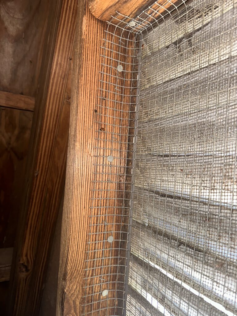 Gutters frozen solid with ice buildup preventing proper drainage.