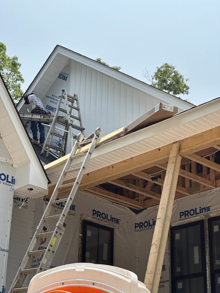 Vented vinyl soffit installation for attic ventilation in Knoxville TN.