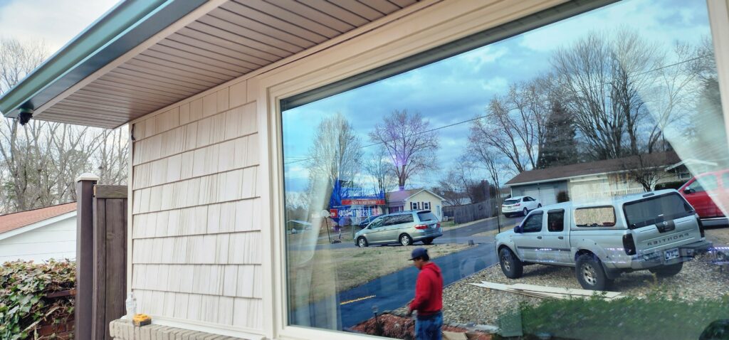 Identifying window leaks caused by poor installation and lack of insulation.