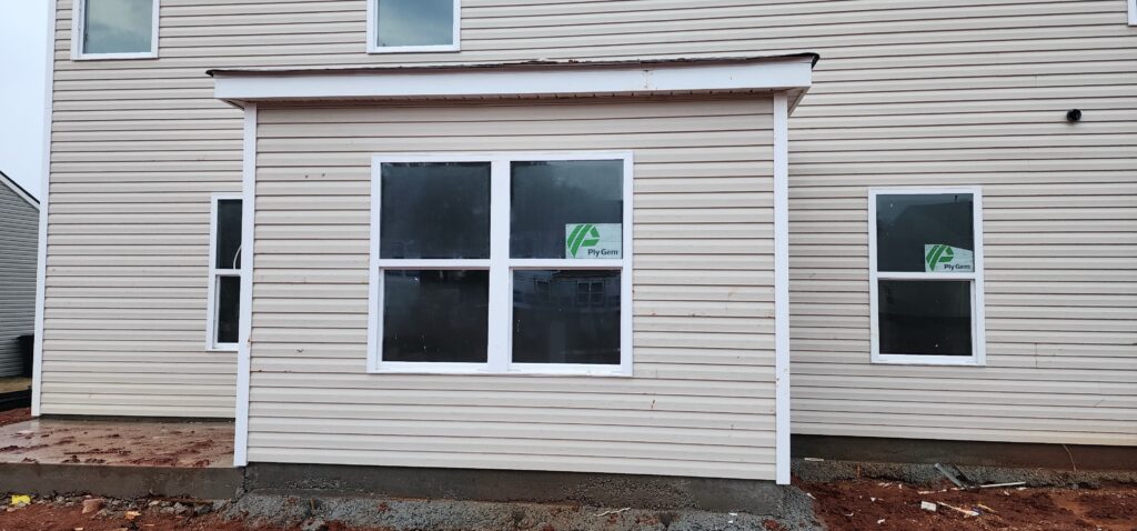 Close-up of double-pane vinyl window with Low-E glass for thermal insulation.