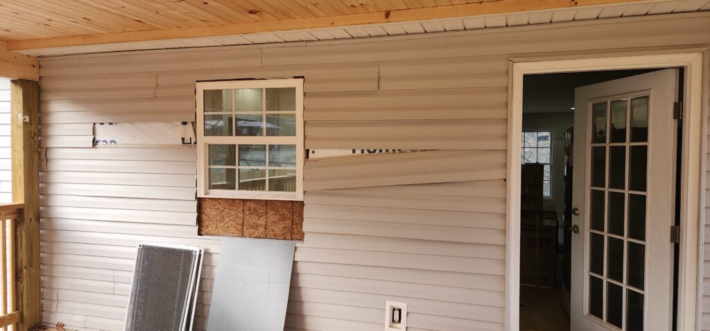 Missing or improperly installed window flashing causing water intrusion.