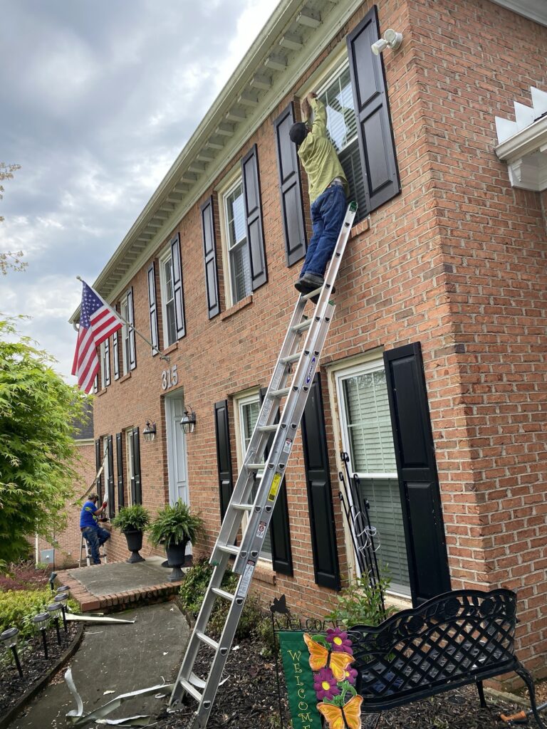 Vertical siding installation on brick home transition Knoxville TN