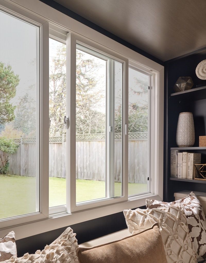 Energy-efficient sliding window with insulated frames and Low-E glass.