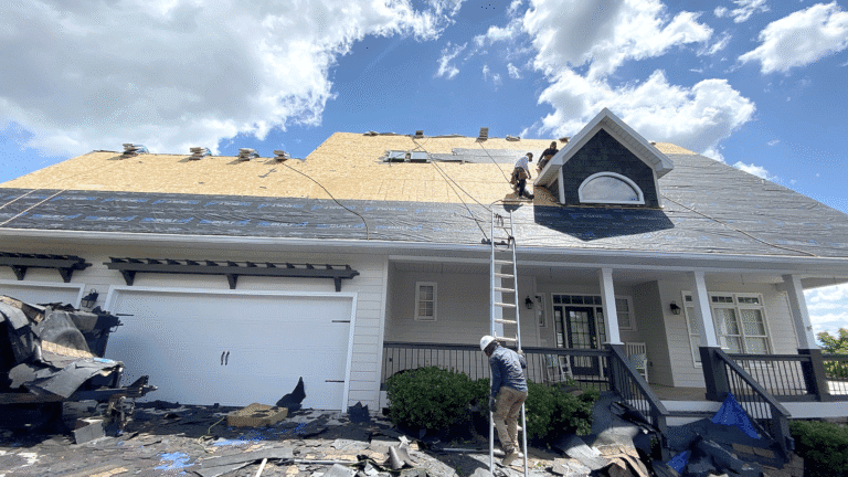 Mel Hernandez inspecting a roof replacement project in Knoxville TN