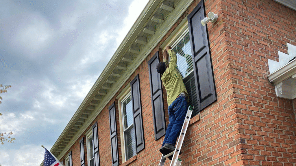 Repairing a window leak by fixing the exterior flashing and siding integration.