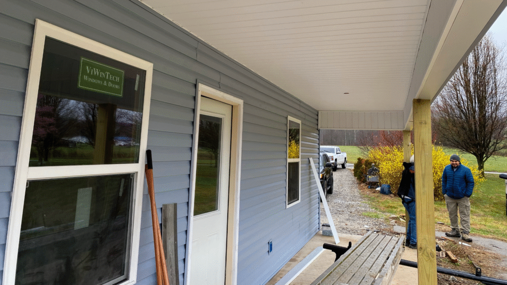 Fixing rotted wood window trim with professional aluminum capping.