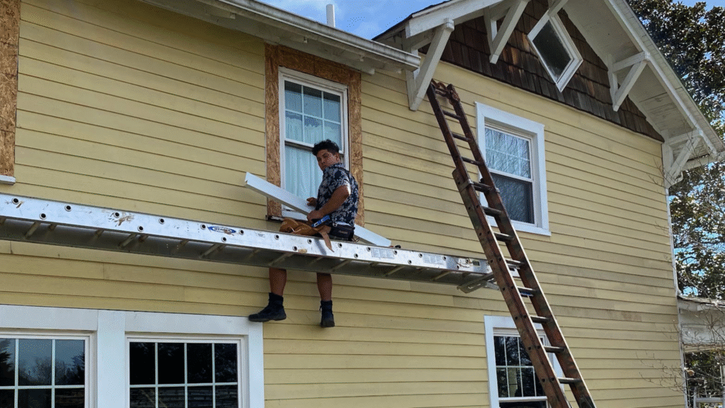 A newly installed energy-efficient window by MI Homesiding & Roofing.