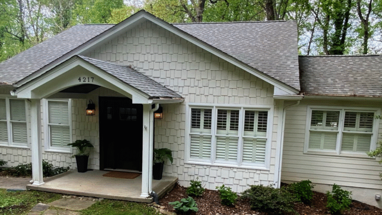 Traditional double hung window showing both sashes open for maximum ventilation.