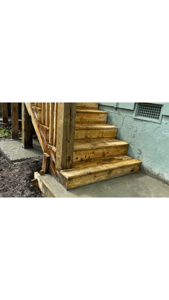 A completed set of safe, level, and solid wooden deck steps.
