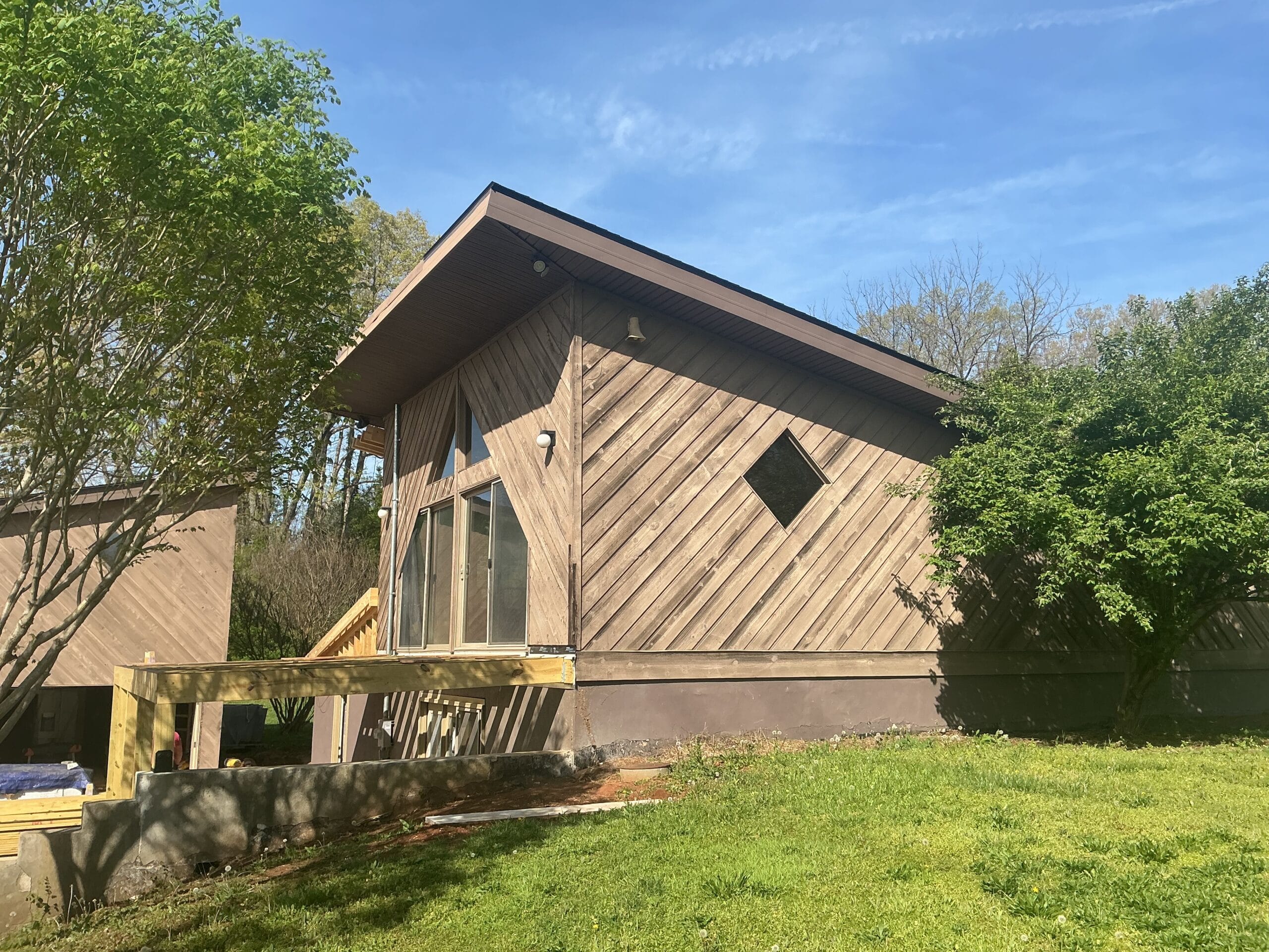 Wood and cedar siding can still look beautiful on the right