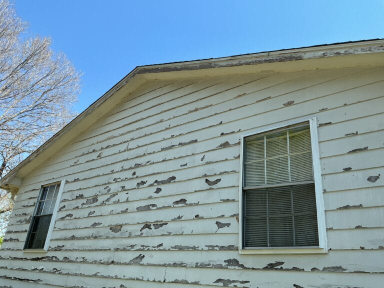 Older home with multiple siding issues requiring a full exterior replacement