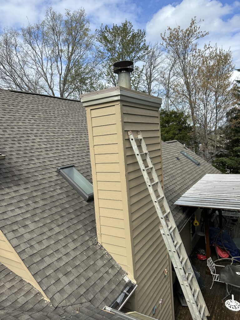 MI Homesiding LLC installing bird-resistant LP SmartSide siding on a home that suffered severe woodpecker damage, preventing future infestations.