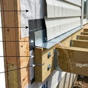 Z-flashing installed behind siding to protect deck ledger board from water damage in Knoxville TN