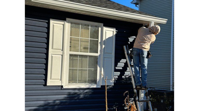 Professional rotted siding repair in Knoxville, TN showing wood rot damage on cedar shingles and underlying structure.