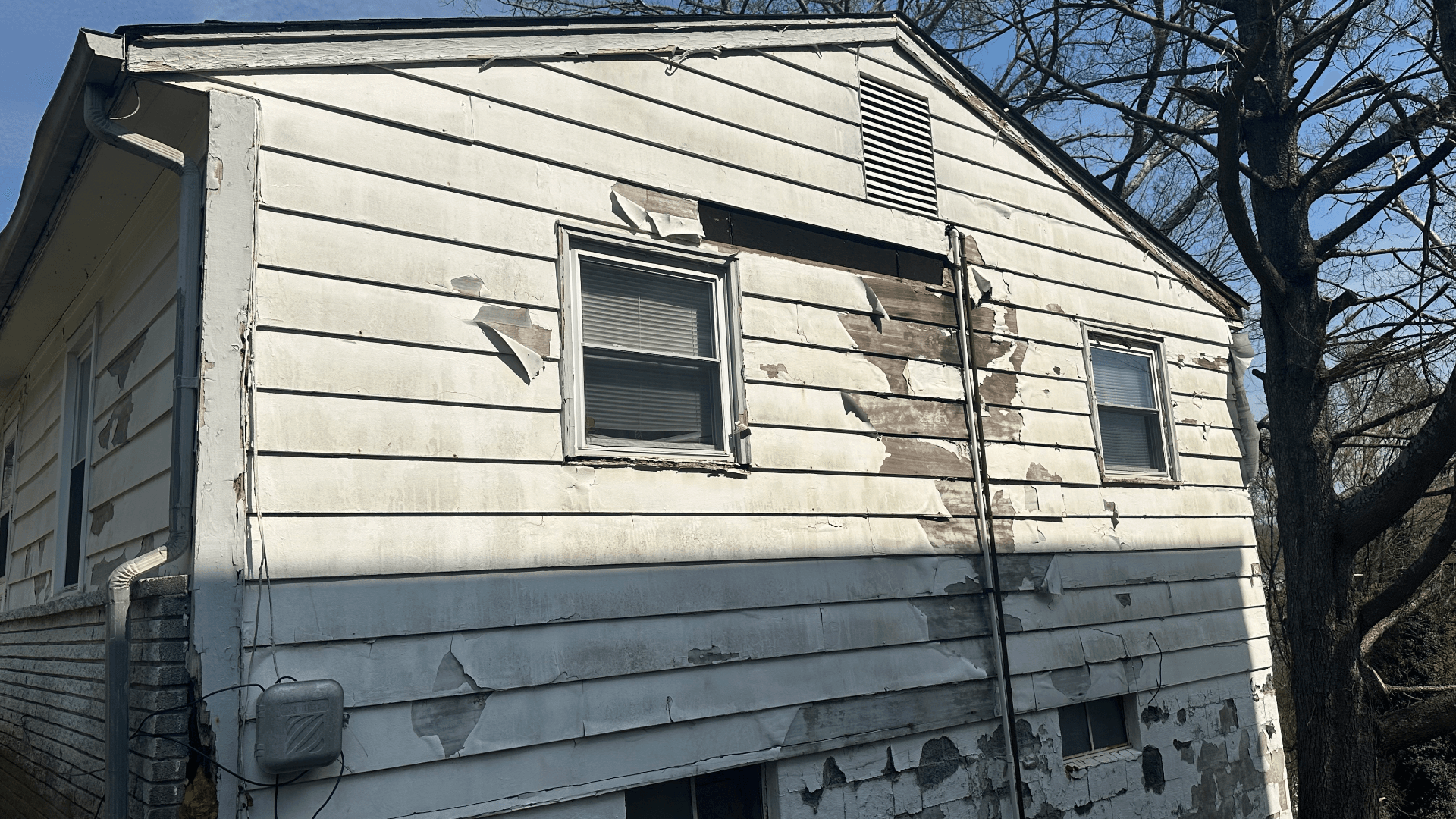 Loose siding creates openings where wind-driven rain can enter behind the