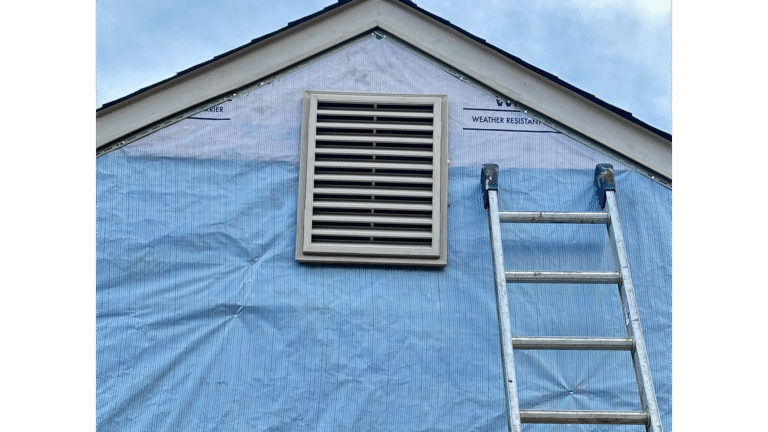 Contractor MI Homesiding consulting with a homeowner on best siding choices for Tennessee.