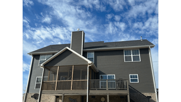 Professional siding painting project on a Knoxville home.