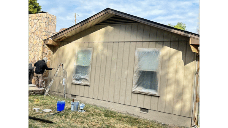 Power washing and cleaning siding before painting in Knoxville.