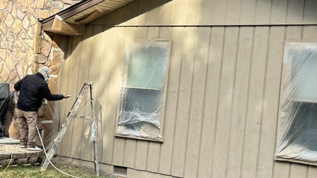Contractor consulting with a homeowner on best siding choices for Tennessee.