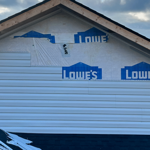 Comparison between vinyl siding and James Hardie fiber cement textures for Knoxville homes.