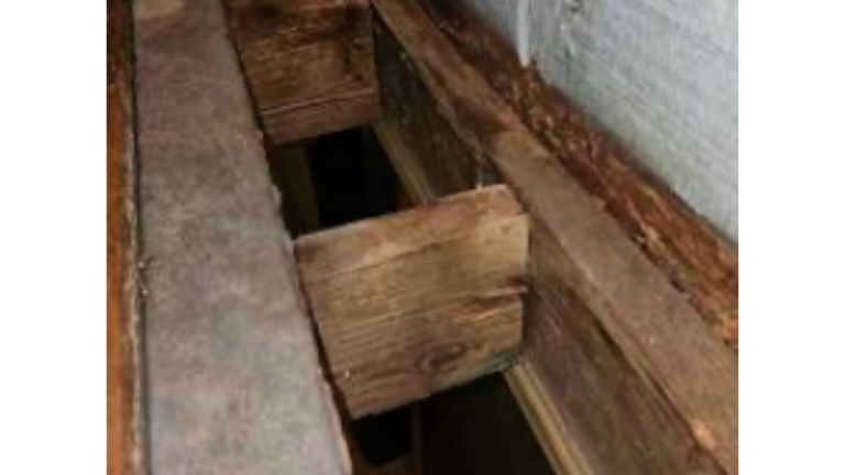 Rotted deck ledger board and structural wood rot due to missing flashing in Knoxville TN