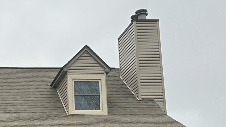 Severe wood rot discovered behind chimney siding during a professional inspection.