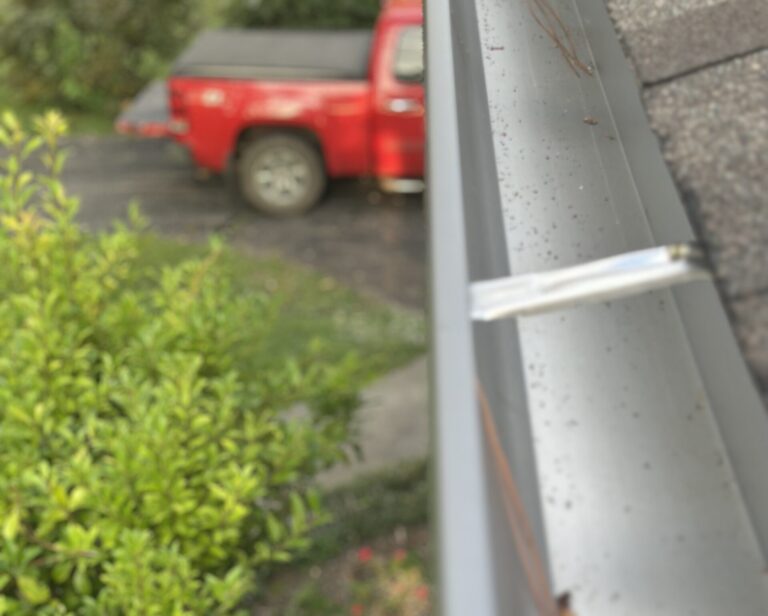 Detailed view of a gutter replacement project in Knoxville revealing hidden wood rot and structural fascia damage being addressed by MI Homesiding LLC.