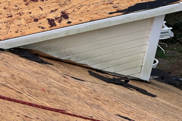 Kick-out flashing installed where the roof slope meets the wall in Knoxville, TN