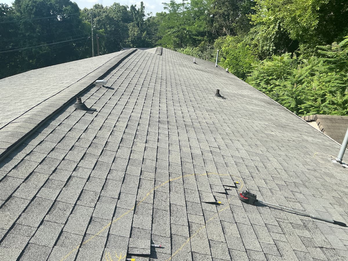 Full roof replacement after wind damage in Knoxville, TN by MI Homesiding & Roofing